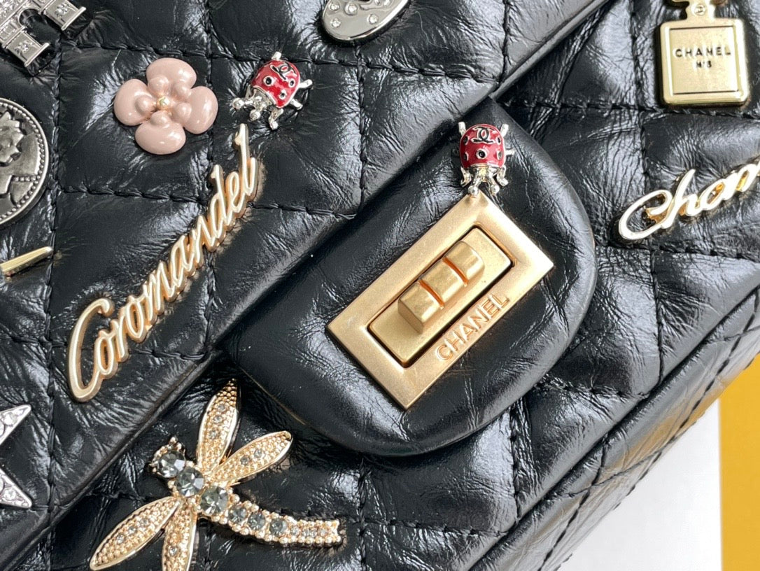 CHANEL, Bags, Chanelaged Calfskin Quilted Lucky Charms 255 Reissue Wallet  On Chainwoc Black
